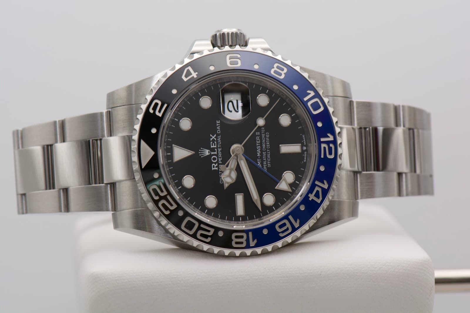Macro detail of a Rolex GMT-Master II bezel and crown